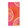 Towel with orange slice design on a pink background