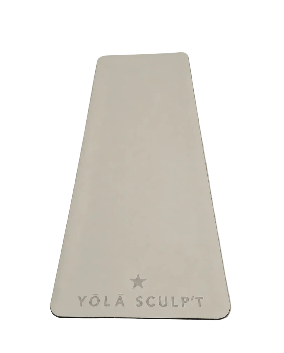 A woman sits on a black yoga mat holding a gymnastic ring, wearing a black sports bra, dark shorts, white socks, and chunky silver sneakers. Two small dumbbells are placed on the mat, which has the brand name 'YÓLA SCULPT' printed on it, against a plain white studio background.