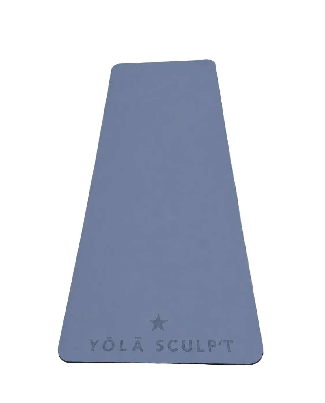 A woman sits on a black yoga mat holding a gymnastic ring, wearing a black sports bra, dark shorts, white socks, and chunky silver sneakers. Two small dumbbells are placed on the mat, which has the brand name 'YÓLA SCULPT' printed on it, against a plain white studio background.