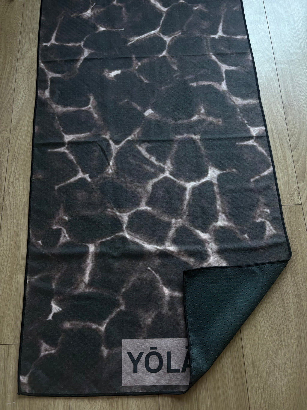 Amber Tortoise Pilates grip towel with tortoise shell print, microfiber suede surface and non-slip silicone dot backing by YŌLĀ SCULP'T