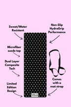 Black and white polka dot yoga mat with non-slip rubber base, microfiber suede top, and included mat strap by YOLA