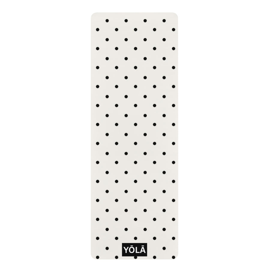 Black and white polka dot yoga mat with non-slip rubber base and microfiber suede top by YOLA