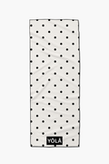 Black and white polka dot yoga mat topper with non-slip microfiber suede surface for Pilates and yoga by YOLA