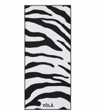 YŌLĀ SCULP'T Zebra Grip Towel featuring a black and white zebra print, made from premium microfiber suede with a non-slip silicone dot backing for hot Pilates and yoga.