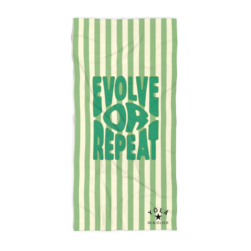 Green Striped Go-To Towel of YOLA SCULPT featuring a soft and absorbent polyester-cotton blend, ideal for beach days, poolside relaxation, travel, and everyday use