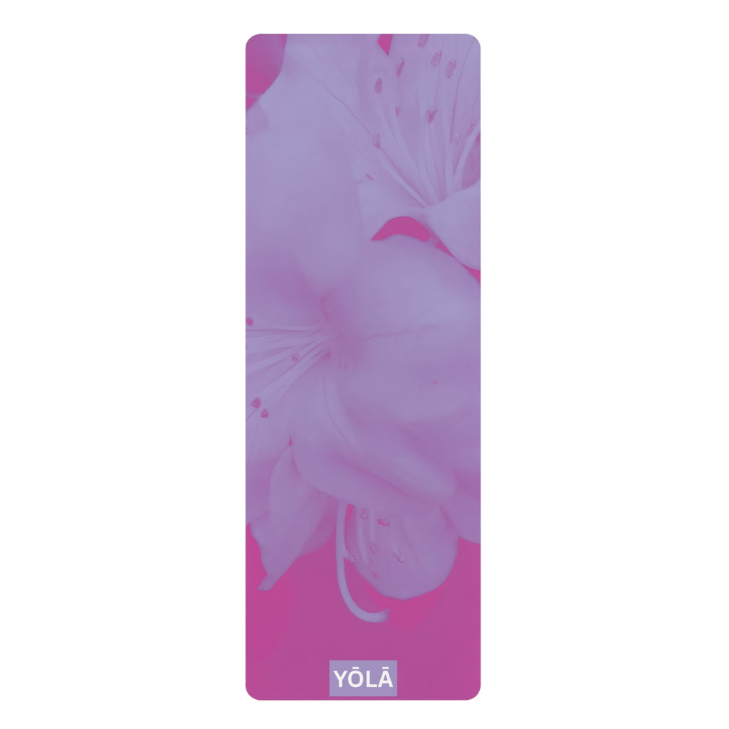 Yoga mat with floral design and 'YOLA' branding on a white background