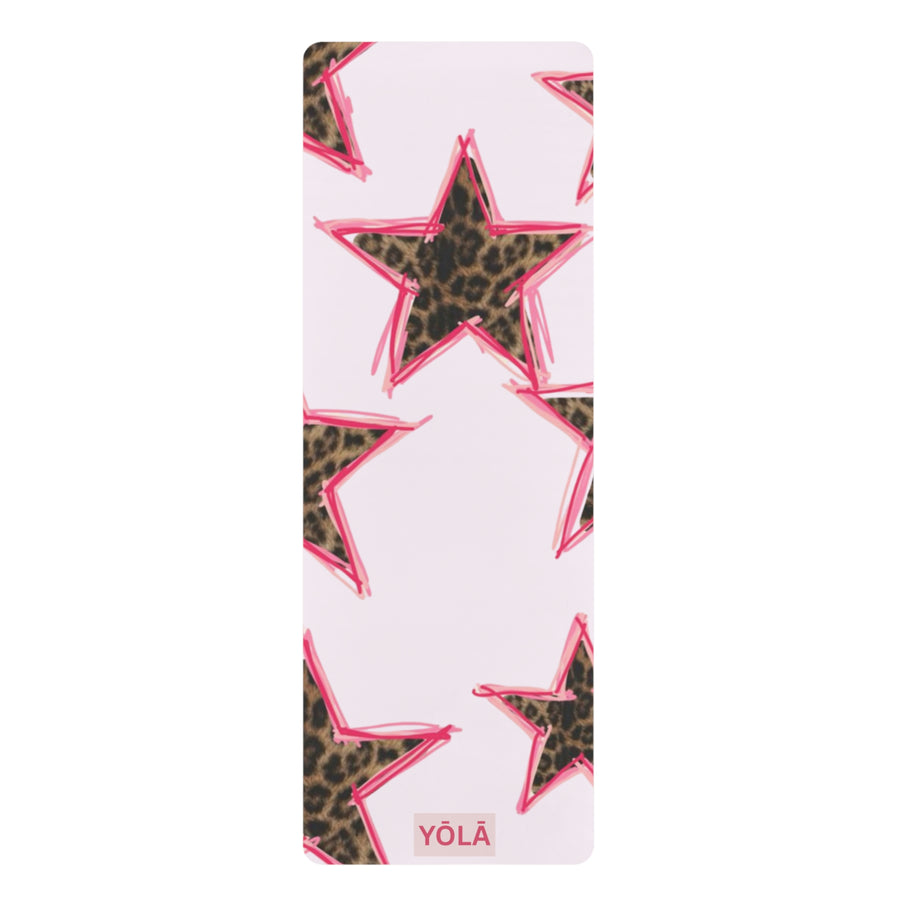 Yoga mat with leopard print star pattern outlined in pink on a soft background with non-slip rubber base by YOLA