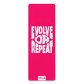 Pink yoga mat with 'Evolve or Repeat' text and YOLA logo on a white background