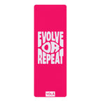 Pink yoga mat with 'Evolve or Repeat' text and YOLA logo on a white background