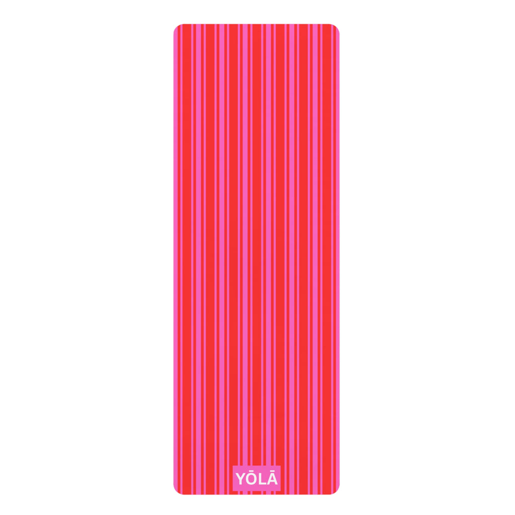 Red and pink striped yoga mat with non-slip rubber base and microfiber suede top by YOLA