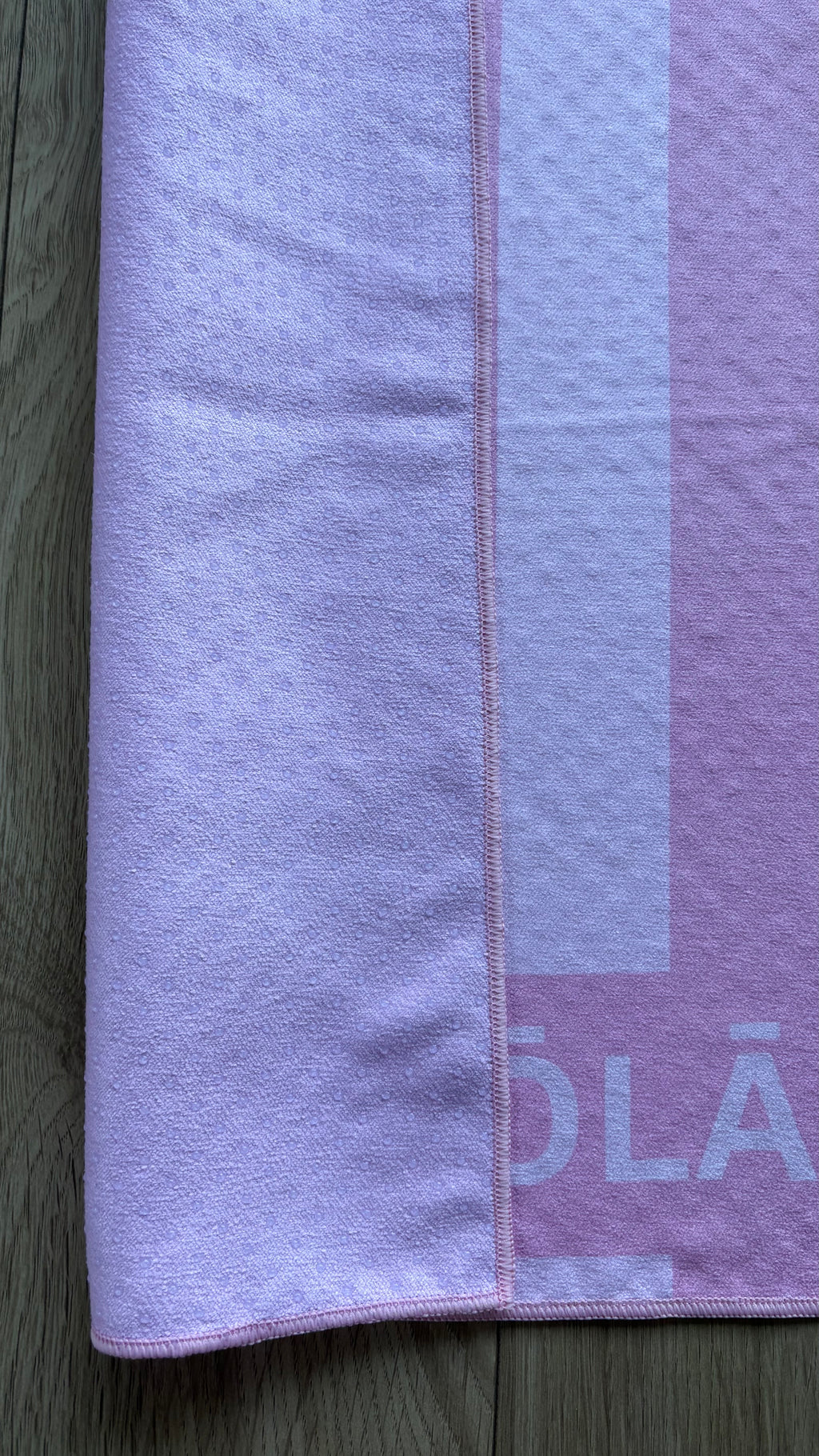 Strawberry Ribbon pink striped Pilates grip towel detail showing premium microfiber suede fabric, stitched edge, and non-slip silicone dots by YŌLĀ SCULP'T